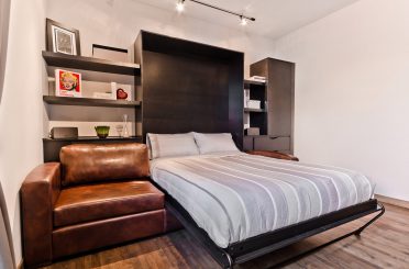 Lit escamotable ouvert avec divan sectionnel