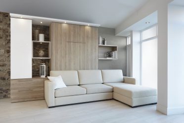 Lit escamotable en bois avec divan